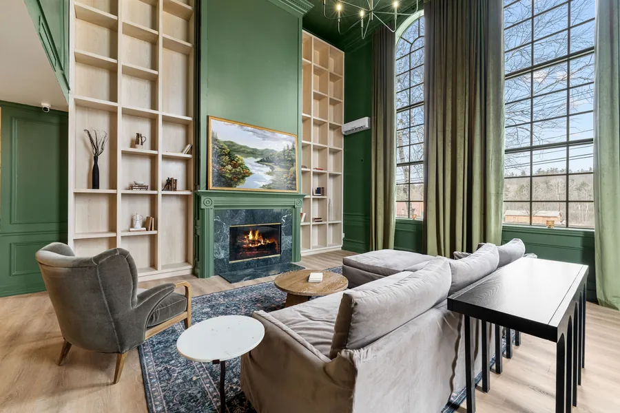 Armchairs and built-in shelves in the Library
