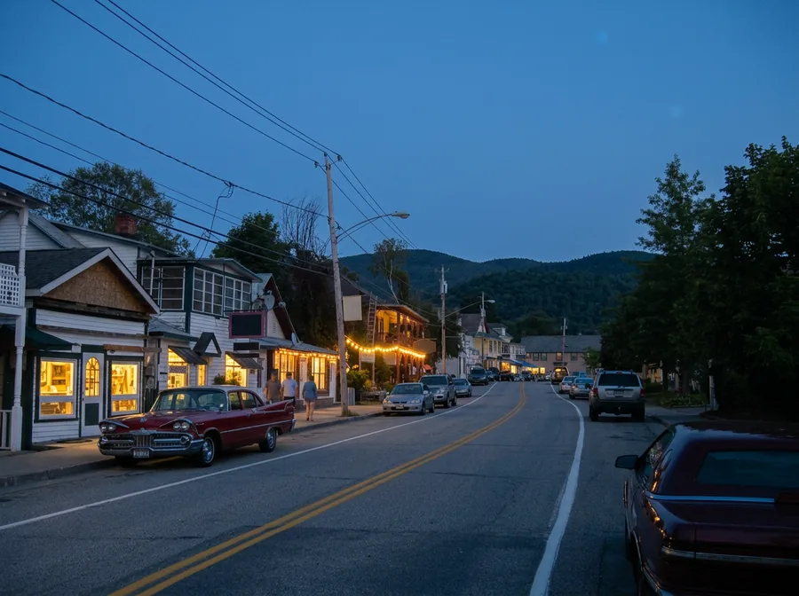 Artist's impression: Main Street in North Creek on a summer evening, warm light in the shop windows